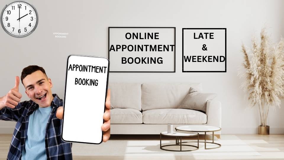 Smiling person holding a phone displaying 'Appointment Booking' with a home interior background, showing signs for 'Online Appointment Booking' and 'Late & Weekend' hours